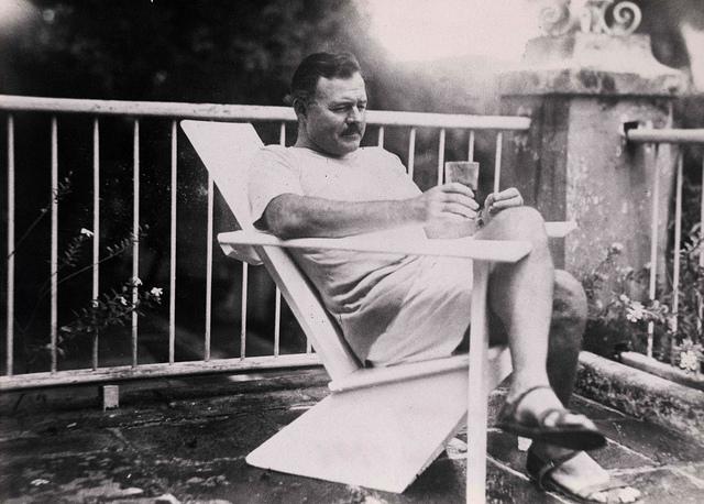 Creativity is Problem Solving - Ernest Hemingway Sitting in a Chair